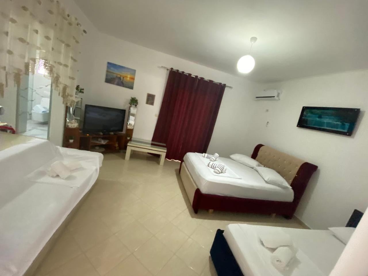Vila Avni Likometi Ksamil Zimmer foto